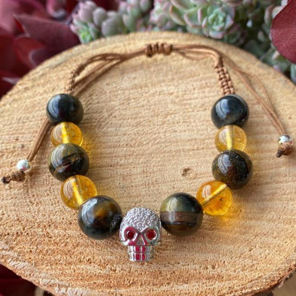 Beautiful citrine bracelet with a skull charm and tiger eye beads.