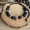 Lava stone, black onyx, rose gold laminated beads and a rose gold skulls with zircones