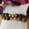 Gorgeous Tiger Eye bracelet, made with 10 mm tiger eye beads delicately wrapped with a light brown waxed string accompanied by four 8mm gold laminated 18K.
