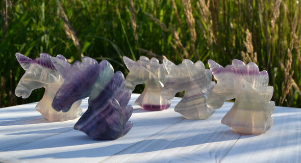 Purple and unicorns with stripes rainbow fluorite amulets 6x6 cms